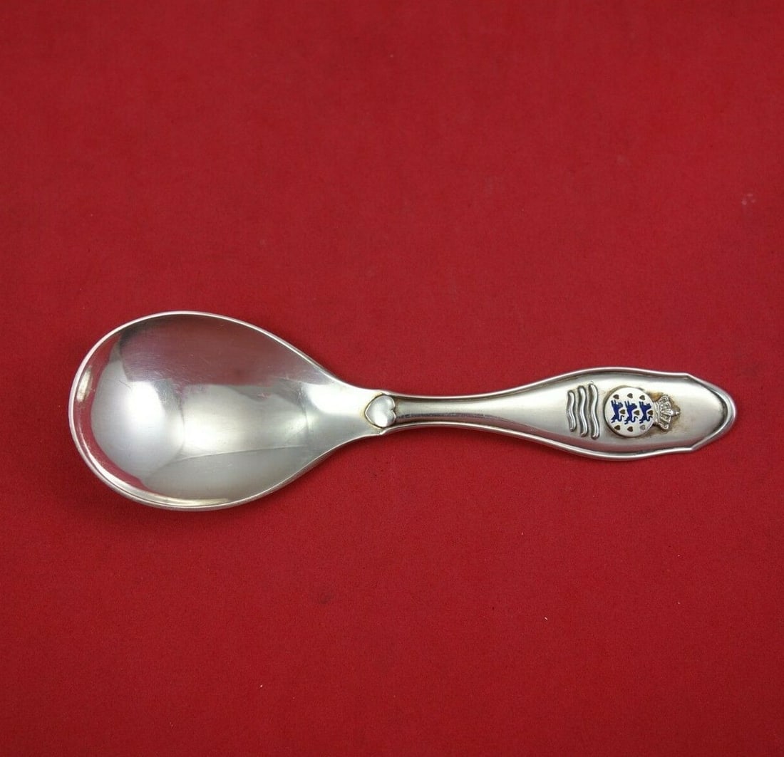 Sterling Silver Tea Caddy Spoon with Enamel Lion Motif by Grann & Laglye 4 1/2 in: Sterling Silver Tea Caddy Spoon with Enamel Lion Motif by Grann & Laglye 4 1/2 in This Danish tea caddy spoon by Grann & Laglye features sterling silver construction with detailed enamel lion accents.