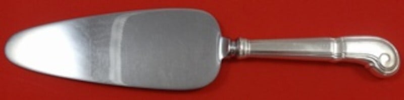 Tiffany & Co Castilian Sterling Silver Cake Server 10 1/4 Pistol Grip: Tiffany & Co Castilian Sterling Silver Cake Server 10 1/4 Pistol Grip Presenting a stunning cake server from the prestigious Castilian pattern by Tiffany & Co. This exquisite piece features a hollow p