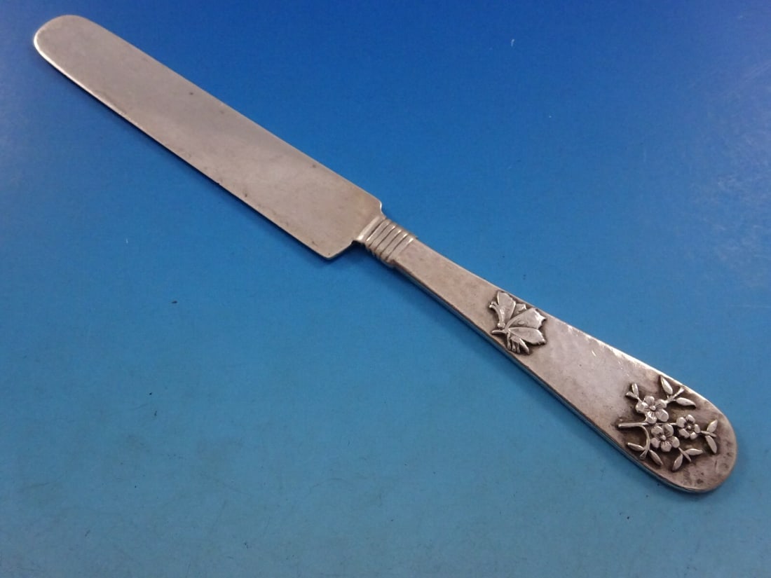 Shiebler Hammered and Applied Sterling Tea Knife 8 in Butterfly Forget Me Nots: Shiebler Hammered and Applied Sterling Tea Knife 8 in Butterfly Forget Me Nots Sterling silver tea knife by Shiebler in the Hammered and Applied pattern. The handle features applied forget-me-not flow
