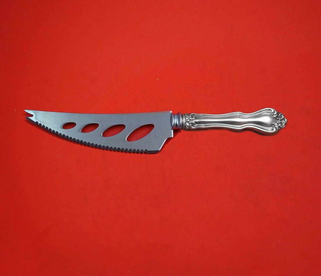 Westmorland George and Martha Sterling Silver Cheese Knife 7 Inch Custom Design: Westmorland George and Martha Sterling Silver Cheese Knife 7 Inch Custom Design This exquisite cheese and sausage knife features a custom design by Westmorland in the elegant George and Martha pattern