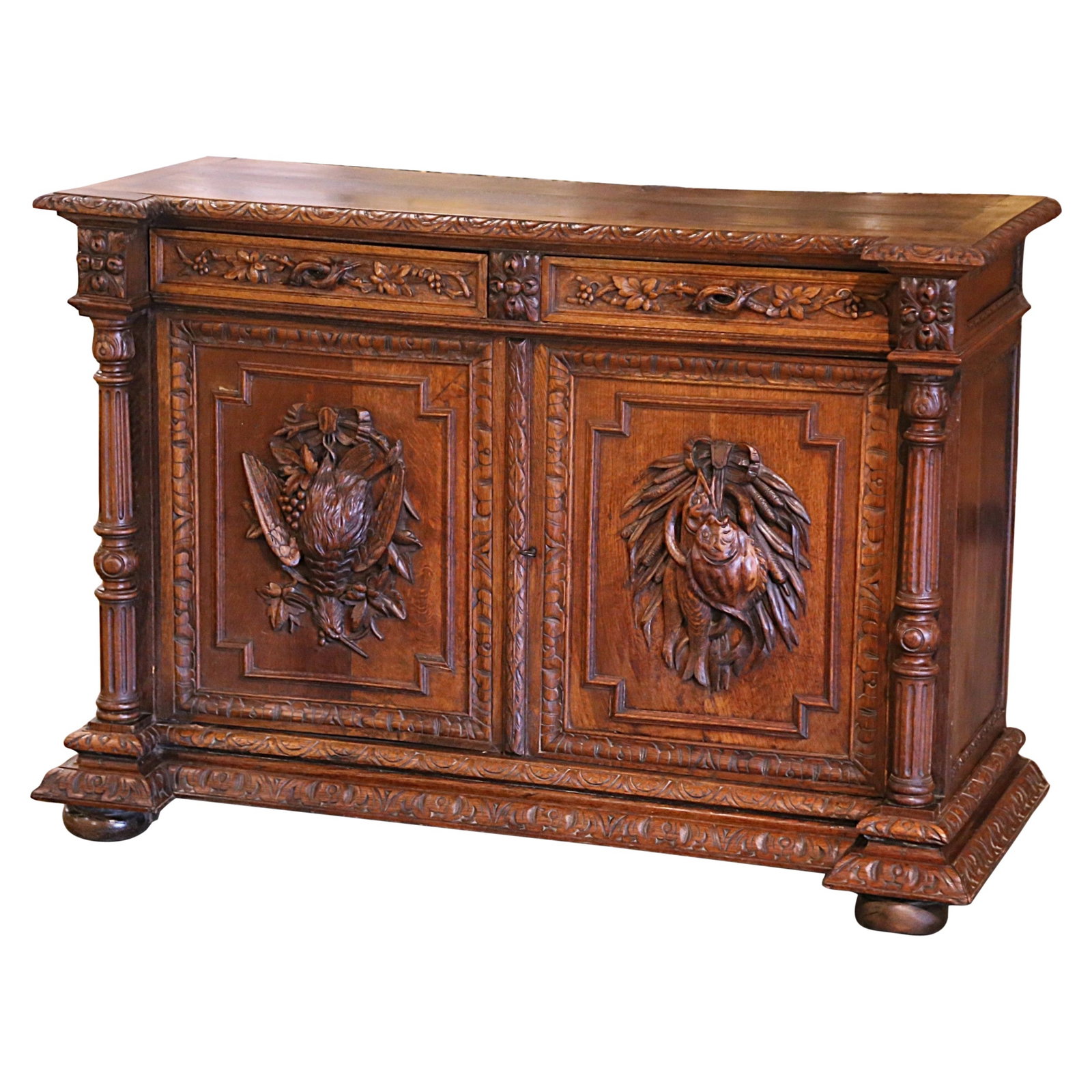 19th Century French Black Forest Oak Hunt Cabinet with Carved Bird and Fish Motifs: 19th Century French Black Forest Oak Hunt Cabinet with Carved Bird and Fish Motifs Discover this stunning 19th Century French Carved Oak Hunt Cabinet, a true masterpiece for collectors and enthusiasts