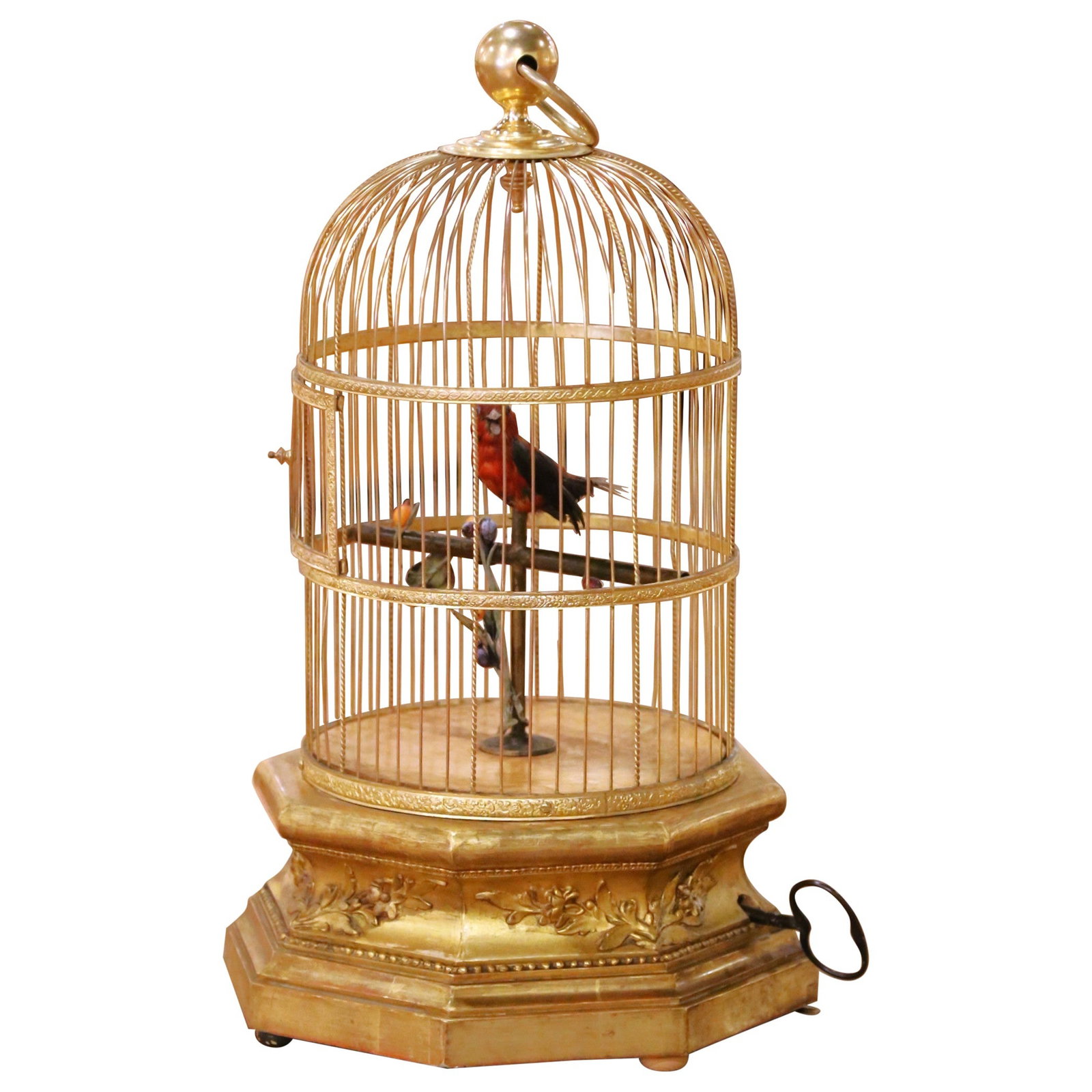 French Gilt Bronze Singing Bird Automaton Circa 1880 on Ornate Giltwood Base: French Gilt Bronze Singing Bird Automaton Circa 1880 on Ornate Giltwood Base This late 19th century French singing bird automaton is a finely crafted example of mechanical artistry from France, made c