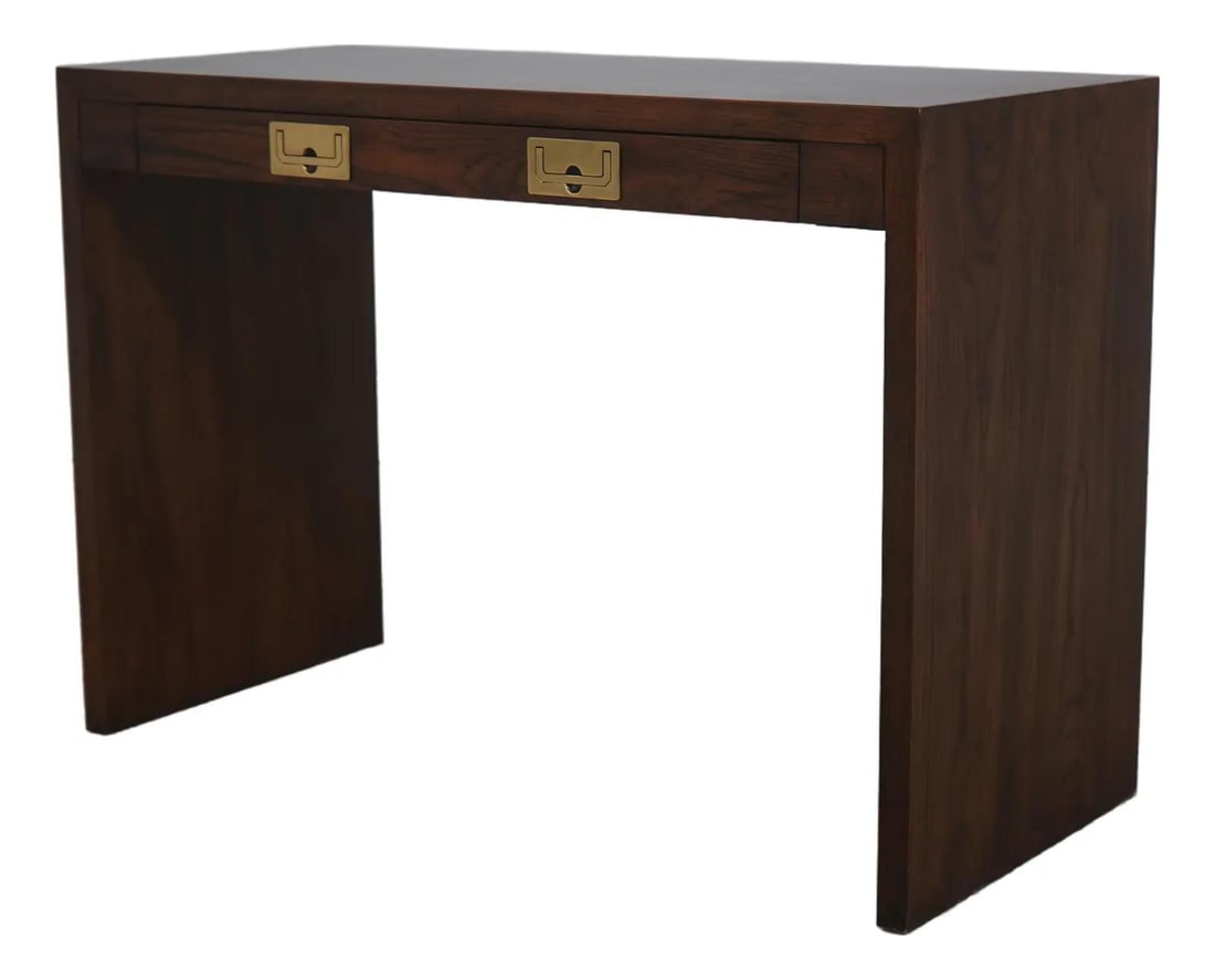 Henredon Oak Writing Desk with Brass Hardware: Henredon Oak Writing Desk with Brass Hardware This Henredon writing desk features a classic campaign style with solid oak construction and traditional recessed solid brass hardware. The desk includes 