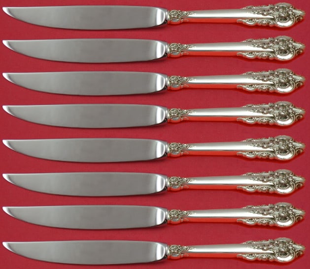 Wallace Grande Baroque Sterling Silver Steak Knife Set 8pc: Wallace Grande Baroque Sterling Silver Steak Knife Set 8pc This exquisite set of 8 steak knives showcases the elegant Grande Baroque pattern by Wallace, crafted from high-quality sterling silver. Each