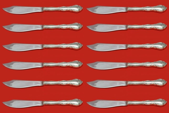 Towle Fontana Sterling Silver Custom Fish Knife Set 12 pcs 8 1/4": Towle Fontana Sterling Silver Custom Fish Knife Set 12 pcs 8 1/4" This exquisite set includes twelve pieces of fish knives from the Fontana pattern by Towle, each measuring 8 1/4 inches. Crafted from 