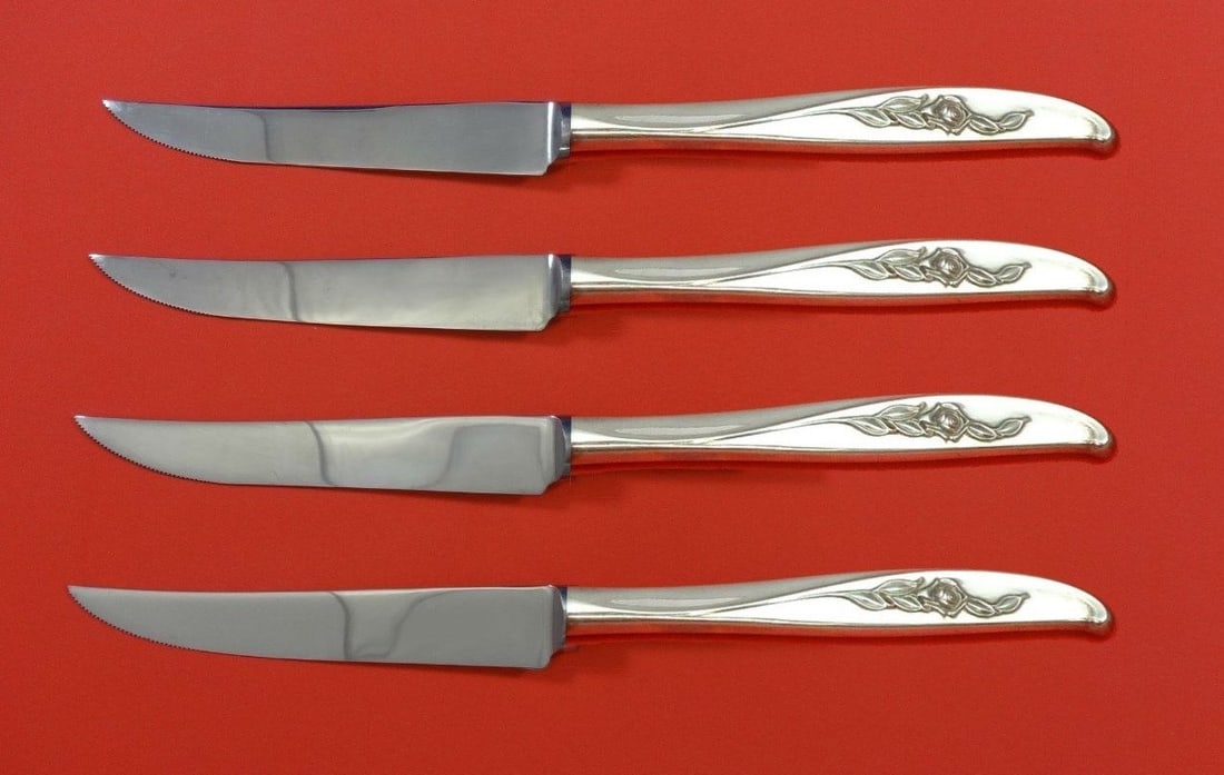 Wallace Penrose Sterling Silver Steak Knife Set 4pc Custom Made: Wallace Penrose Sterling Silver Steak Knife Set 4pc Custom Made This exquisite 4-piece steak knife set is crafted from sterling silver with a hollow handle, showcasing the elegant Penrose pattern by W