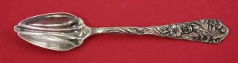Reed and Barton Flora Sterling Silver Grapefruit Spoon Gold Washed Fluted 5 3/4: Reed and Barton Flora Sterling Silver Grapefruit Spoon Gold Washed Fluted 5 3/4 Sterling silver grapefruit spoon in the Flora pattern by Reed & Barton. It features a gold-washed, fluted design and mea