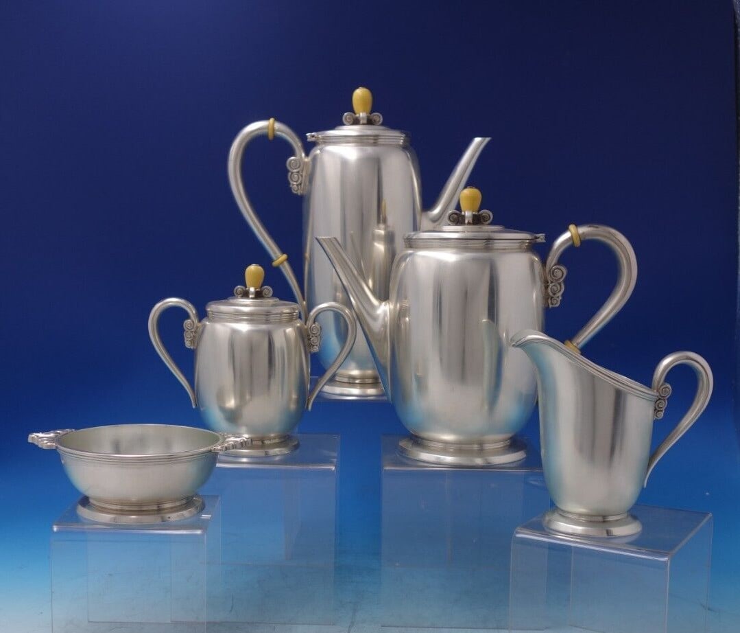 International Sterling Silver Northern Lights 5pc Tea Set by Alfred G Kintz: International Sterling Silver Northern Lights 5pc Tea Set by Alfred G Kintz Experience the elegance of the Northern Lights Sterling Silver Tea Set by International, a distinguished five-piece collecti