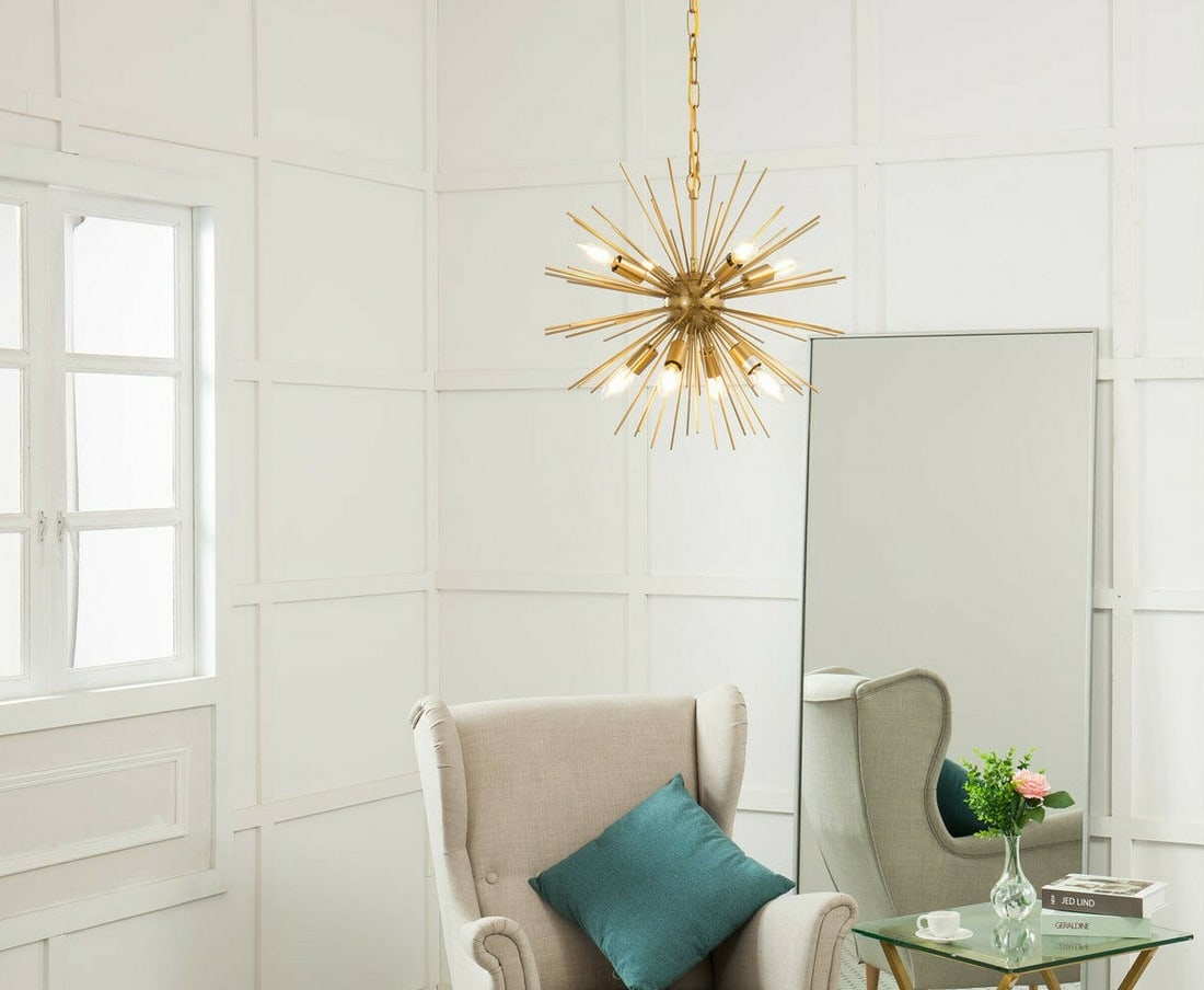 Timber 8 Light Brass Sputnik Chandelier 20 Inch: Timber 8 Light Brass Sputnik Chandelier 20 Inch This modern Sputnik-style chandelier features a striking brass finish and an array of rods radiating from the center, creating a bold focal point for an