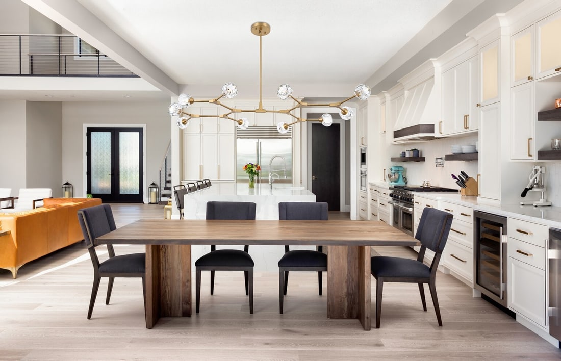 Zayne 10 Light Crystal Iron Pendant in Gold: Zayne 10 Light Crystal Iron Pendant in Gold Modern 10-light pendant chandelier designed for indoor use, featuring a gold finish with crystal and iron construction. It has a clear crystal shade design,