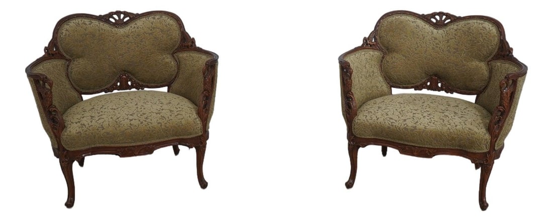 French Louis XV swan carved armchairs pair green upholstered: French Louis XV swan carved armchairs pair green upholstered This pair of French Louis XV style occasional chairs features wide seats and intricately carved swan arms. The butterfly-shaped backs and h