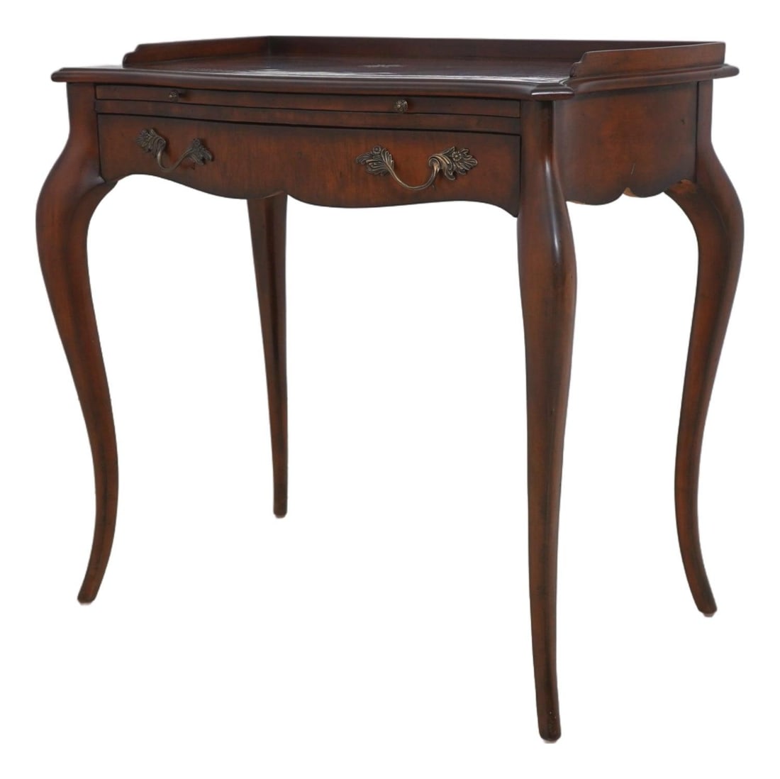 Mahogany Writing Desk with Tooled Leather Top and Brass Hardware: Mahogany Writing Desk with Tooled Leather Top and Brass Hardware This French Country style writing desk by Maitland Smith features high-quality mahogany wood construction with a factory distressed fin