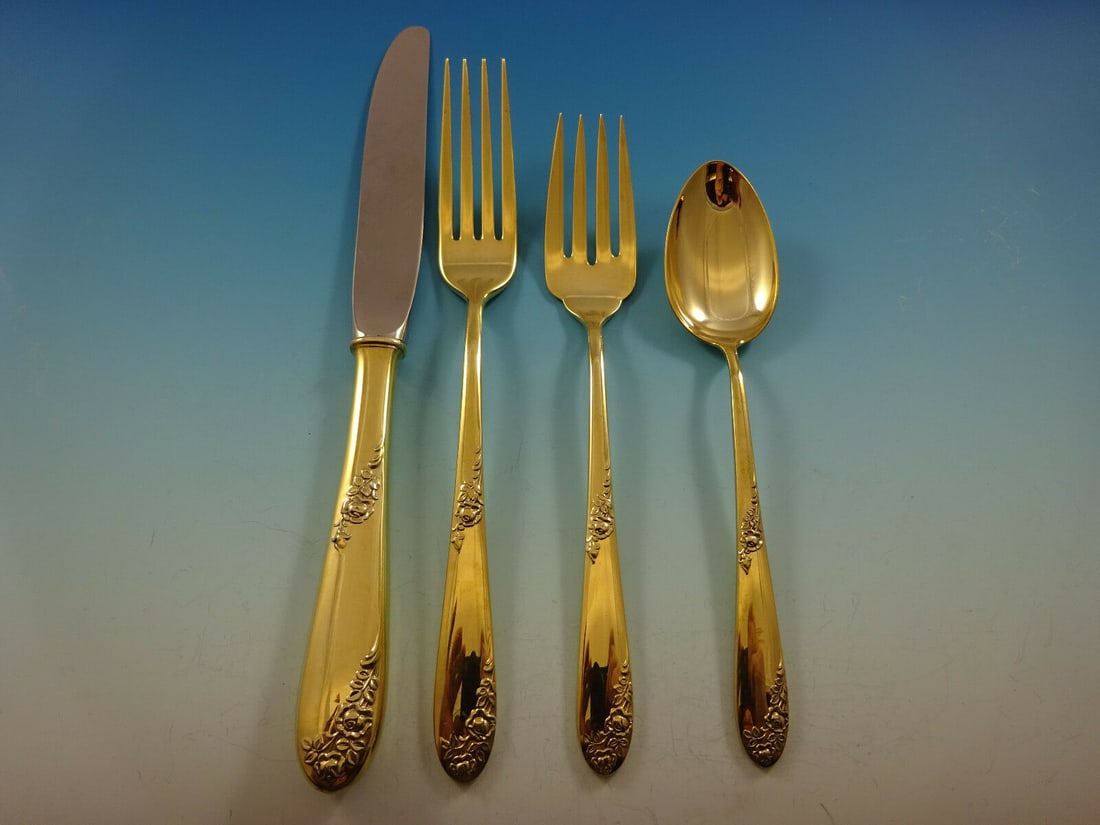 Lunt Sweetheart Rose Vermeil Sterling Silver 4-Piece Place Setting: Lunt Sweetheart Rose Vermeil Sterling Silver 4-Piece Place Setting Enhance your dining experience with this exquisite Sweetheart Rose Vermeil place setting by Lunt. Crafted from high-quality sterling 