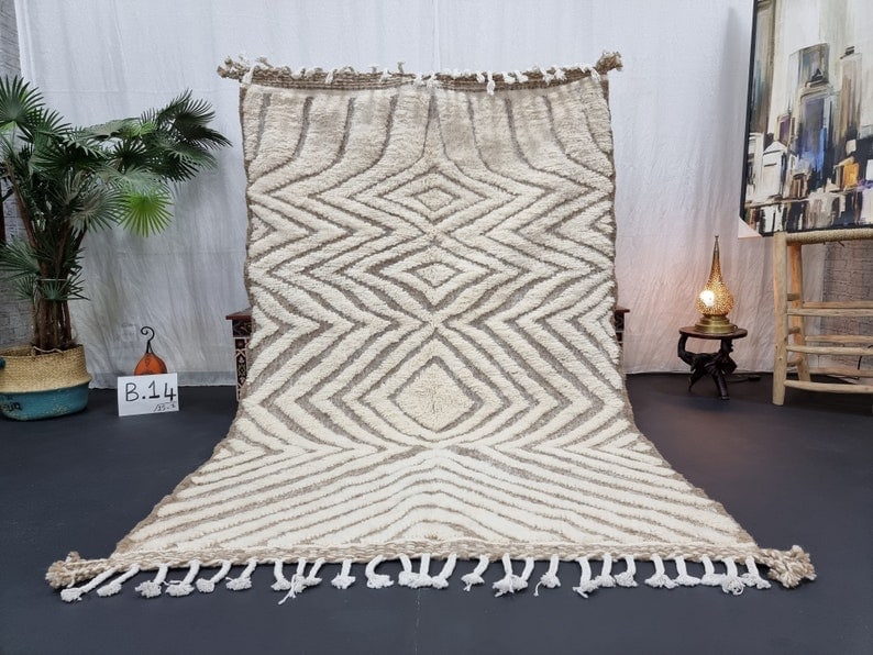 Elegant Handwoven Soft Engraved Rug 100% Sheep Wool Morocco 8 x 5 Feet: Elegant Handwoven Soft Engraved Rug 100% Sheep Wool Morocco 8 x 5 Feet Discover the elegance of this handwoven Soft Engraved Rug, crafted by local Berber women weavers in the Atlas Mountains of Morocc