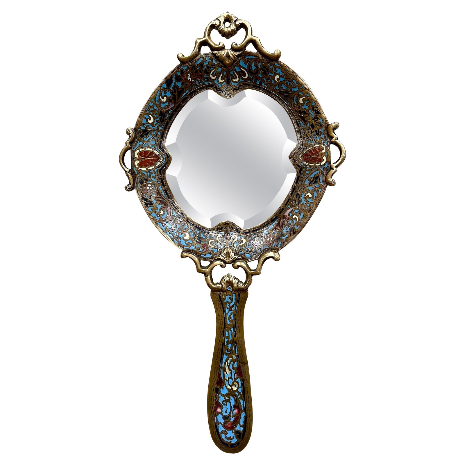 French Louis XV Brass Champleve Hand Vanity Mirror: French Louis XV Brass Champleve Hand Vanity Mirror This late 19th-century French hand mirror is crafted in the Louis XV style, featuring a richly ornate brass frame adorned with intricate champleve en