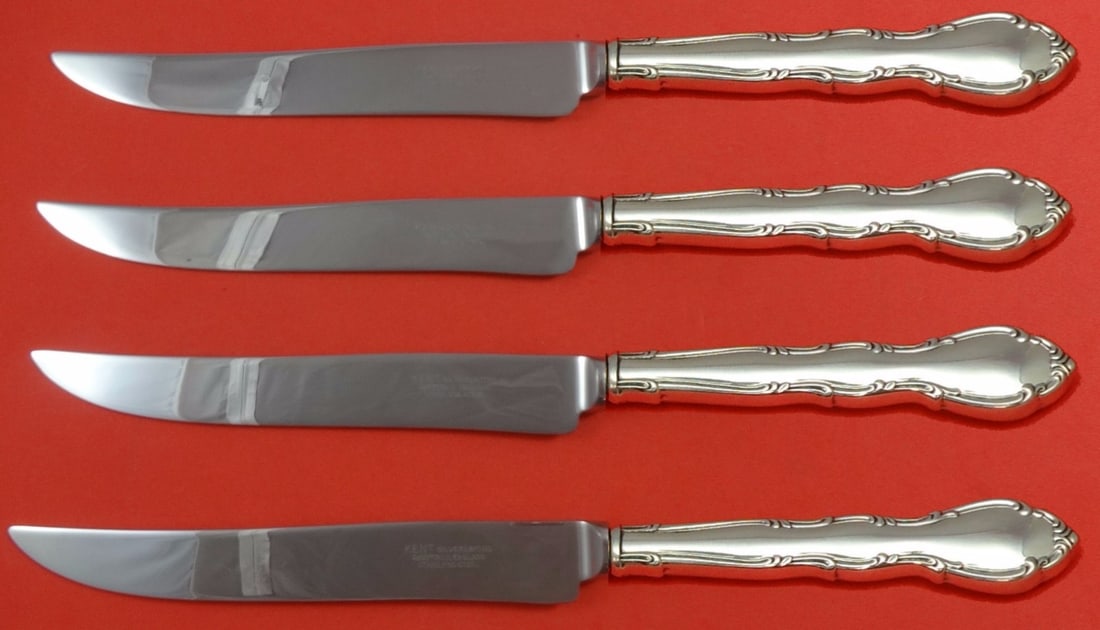 Gorham Andante Sterling Silver Steak Knife Set 4pc Texas Sized: Gorham Andante Sterling Silver Steak Knife Set 4pc Texas Sized Elevate your dining experience with the Andante by Gorham Sterling Silver Steak Knife Set. This exquisite 4-piece set features large, Tex