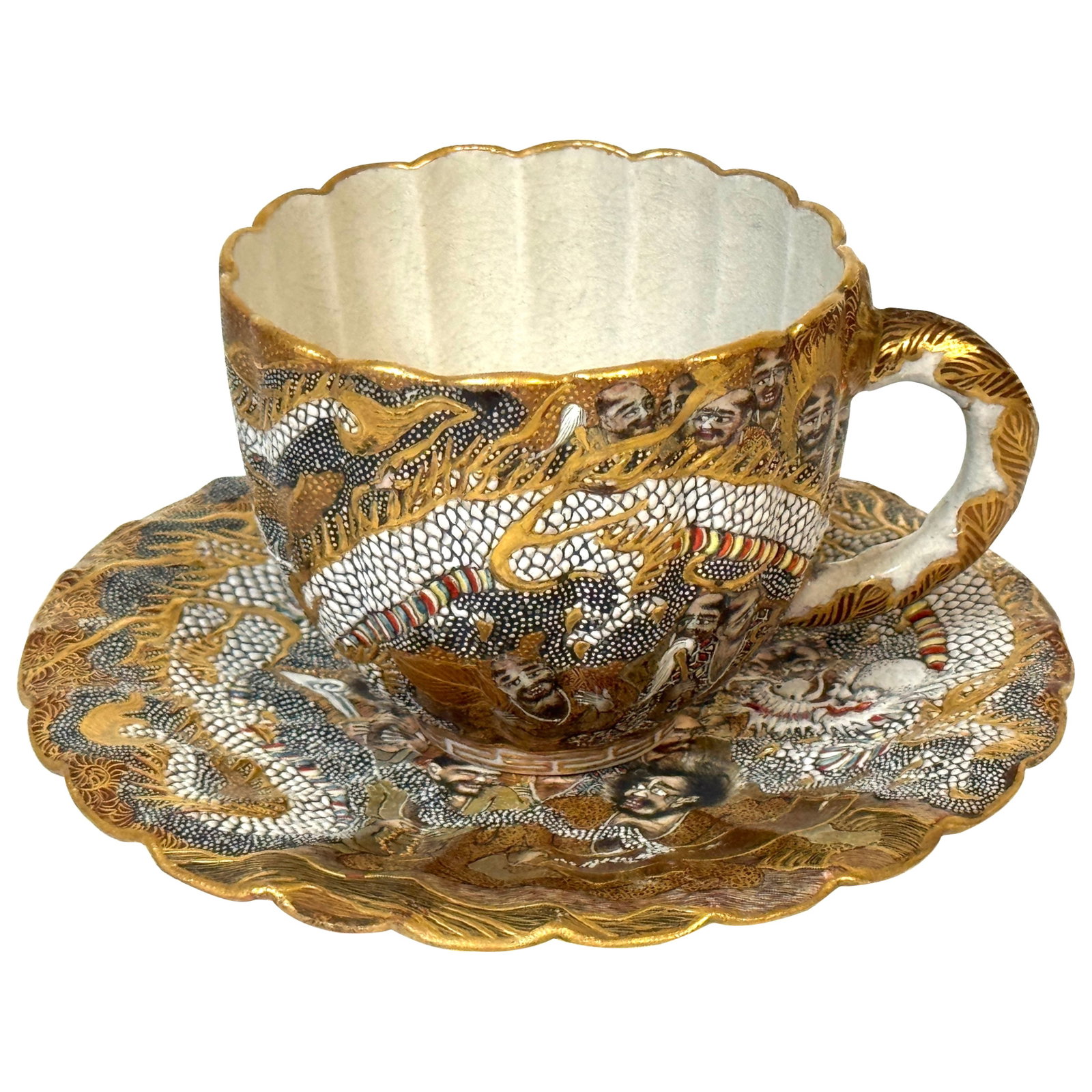 Meiji Satsuma Dragons Immortals Cup Saucer Set by Kitagawa-zo Signed Dai Nippon: Meiji Satsuma Dragons Immortals Cup Saucer Set by Kitagawa-zo Signed Dai Nippon This exquisite Meiji Satsuma cup and saucer set, attributed to the renowned Kitagawa-zo workshop, features stunning hand