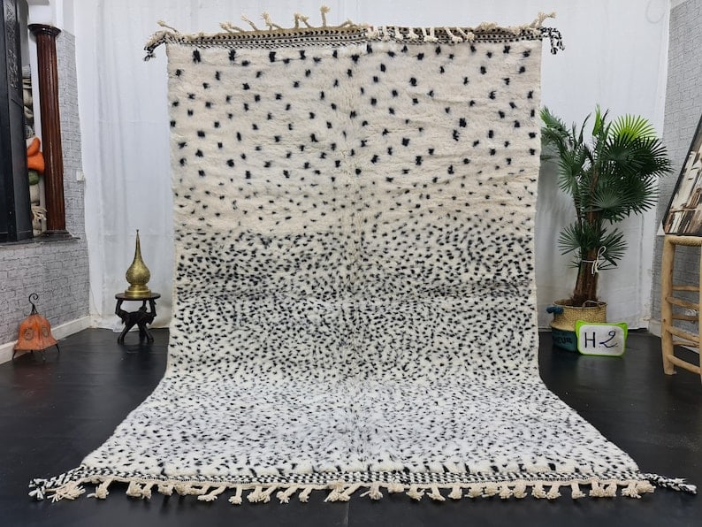 Authentic Handwoven Soft Dotted Rug 8 x 5 Feet Moroccan Wool: Authentic Handwoven Soft Dotted Rug 8 x 5 Feet Moroccan Wool This Authentic Soft Dotted Rug is handwoven in the Atlas Mountains by skilled local Berber women weavers, utilizing traditional techniques 