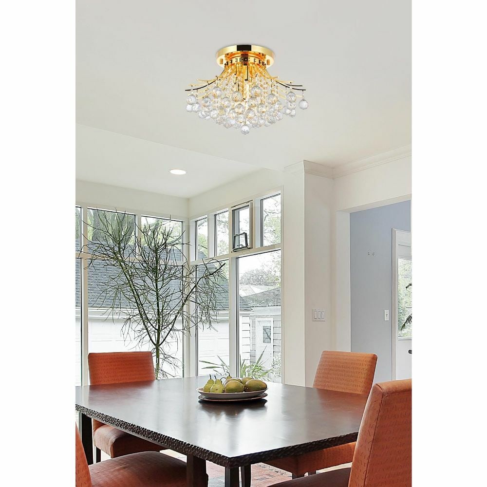 Toureg 6 Light Gold Crystal Flush Mount Chandelier 19 inch: Toureg 6 Light Gold Crystal Flush Mount Chandelier 19 inch This modern crystal chandelier features a gold-plated finish and a semi-flush mount design, ideal for dining rooms, bedrooms, living rooms, f