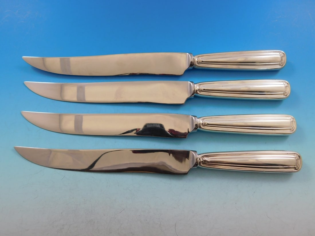 Tiffany & Co. Saint Dunstan 4pc Sterling Steak Knife Set Texas Sized: Tiffany & Co. Saint Dunstan 4pc Sterling Steak Knife Set Texas Sized Experience the exquisite craftsmanship of the Saint Dunstan flatware pattern by Tiffany & Co. This 4-piece steak knife set is custo