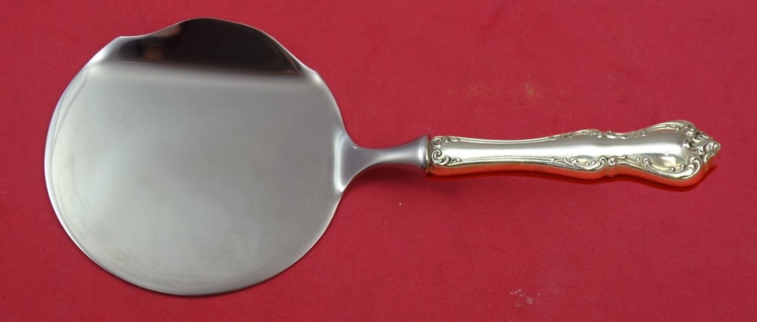 Towle Debussy Sterling Silver 8" Cranberry Server Custom Made: Towle Debussy Sterling Silver 8" Cranberry Server Custom Made This custom-made 8" cranberry server is crafted from high-quality sterling silver with a hollow handle and a round stainless steel blade, 