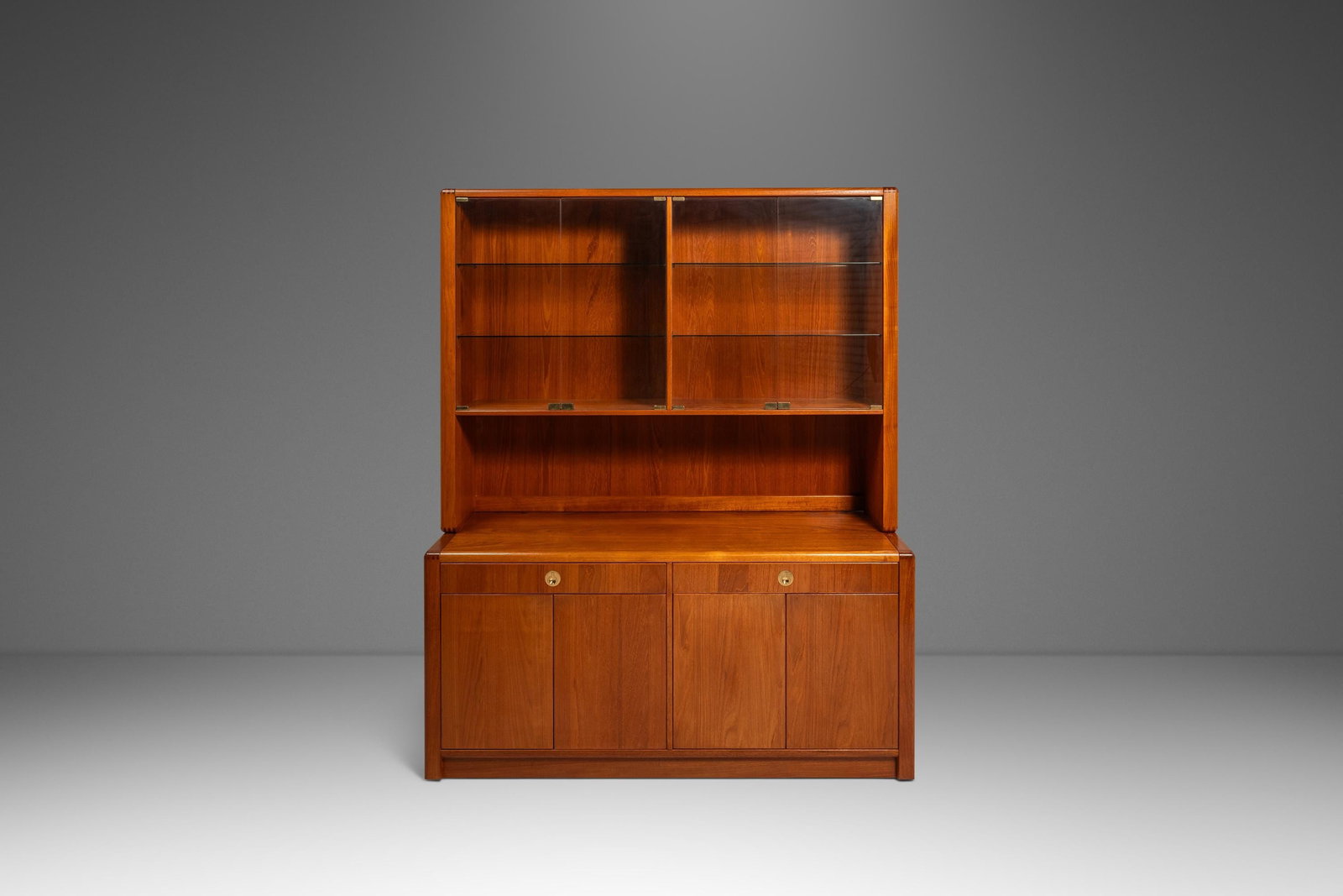 D-Scan Danish Modern Teak and Brass Two-Piece Sideboard Cabinet With Display Top: D-Scan Danish Modern Teak and Brass Two-Piece Sideboard Cabinet With Display Top This Mid-Century Danish Modern two-piece cabinet by D-Scan, dating from the 1980s, features both a sideboard/credenza a