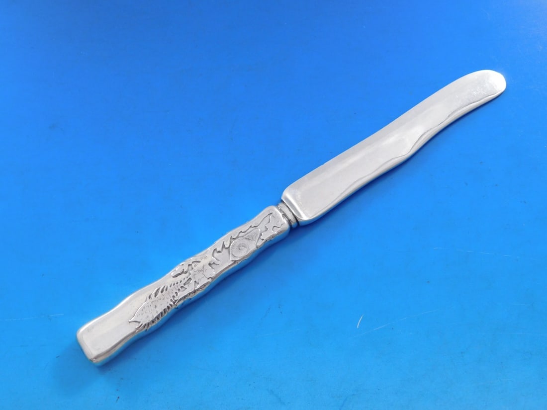 Tiffany Sterling Silver Lap Over Edge Dessert Knife Acid Etched Snail Seaweed: Tiffany Sterling Silver Lap Over Edge Dessert Knife Acid Etched Snail Seaweed Indulge in a piece of history with this exquisite dessert knife from Tiffany & Co., featuring the elegant Lap Over Edge pa