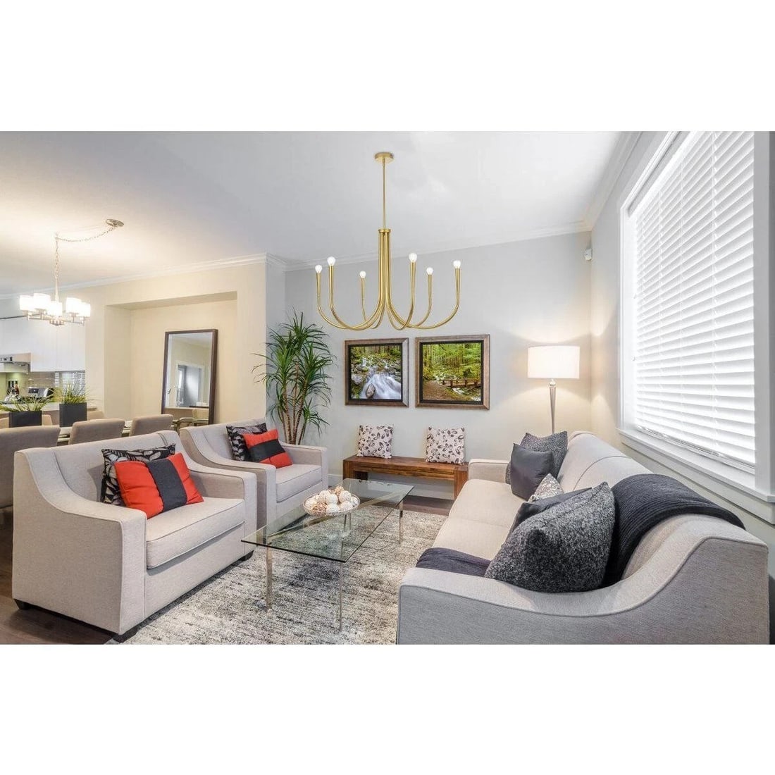 Living District Layne 6 Light Brass Chandelier 36 in Farmhouse Style: Living District Layne 6 Light Brass Chandelier 36 in Farmhouse Style Modern farmhouse 6-light chandelier ceiling fixture in a brass finish with a metal frame. It is hardwired, dimmable, and designed f
