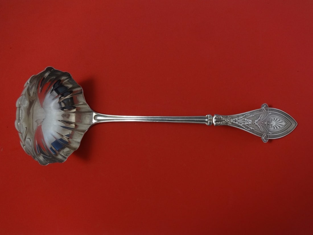 Tiffany & Co. Italian Sterling Silver Fluted Soup Ladle 13": Tiffany & Co. Italian Sterling Silver Fluted Soup Ladle 13" This stunning soup ladle by Tiffany & Co. features the elegant 'Italian' pattern and is crafted from high-quality sterling silver. Measuring