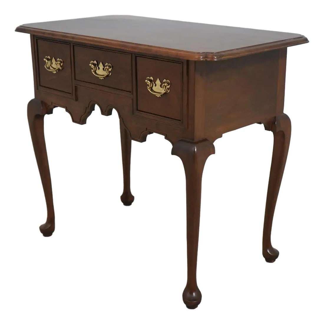 Stickley Cherry Wood Lowboy Dressing Table with 3 Drawers: Stickley Cherry Wood Lowboy Dressing Table with 3 Drawers This exquisite Stickley Cherry 3 Drawer Lowboy Dressing Table, dating back to approximately 1983, showcases the craftsmanship that Stickley is