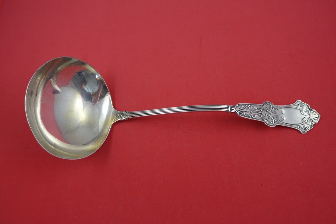 Whiting Alhambra Sterling Silver Oyster Ladle 11 Inch: Whiting Alhambra Sterling Silver Oyster Ladle 11 Inch Discover the elegance of the Alhambra pattern with this exquisite sterling silver oyster ladle by Whiting. Crafted between 1850 and 1899, this lad