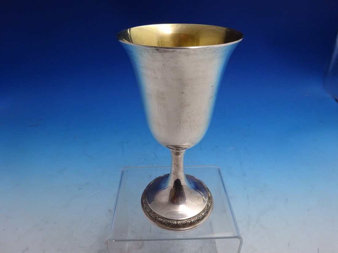Sterling Silver Water Goblet Prelude Pattern Gold Washed Interior: Sterling Silver Water Goblet Prelude Pattern Gold Washed Interior This International Silver water goblet from the Prelude pattern features sterling silver construction with a gold-washed interior. The