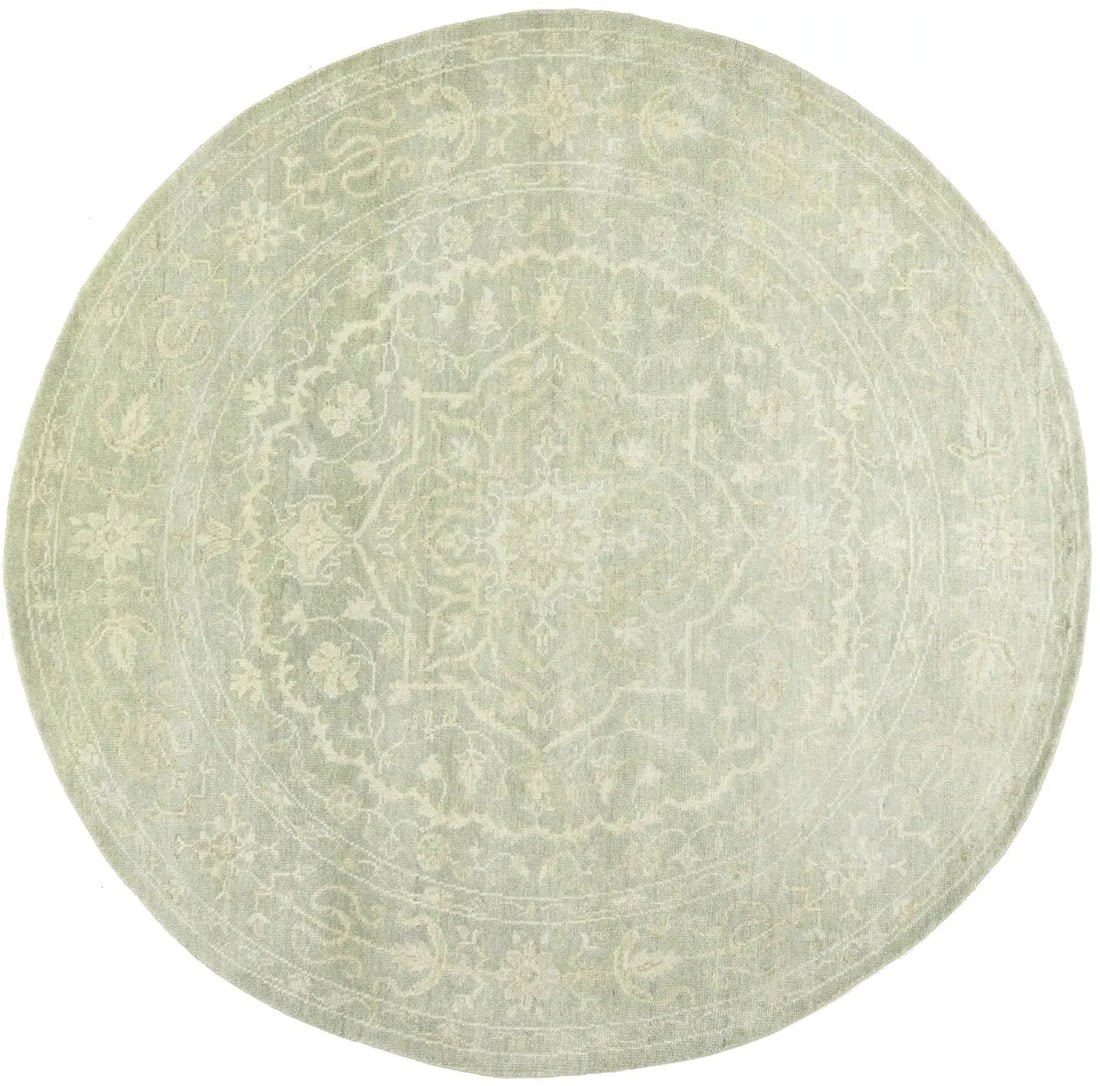 Hand-Knotted Wool Round Rug 5'11 x 6'0 Floral Transitional Design: Hand-Knotted Wool Round Rug 5'11 x 6'0 Floral Transitional Design This round area rug features a hand-knotted wool construction with a distressed floral pattern in muted tones of green, cream, and bro