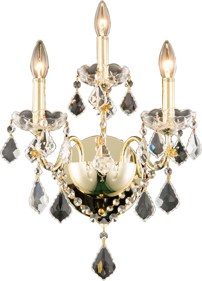 St. Frances Gold Crystal Wall Sconce 3 Light 17 Inch: St. Frances Gold Crystal Wall Sconce 3 Light 17 Inch This contemporary wall sconce features three lights and a gold finish, complemented by clear royal cut crystals and French pendant crystal accents.