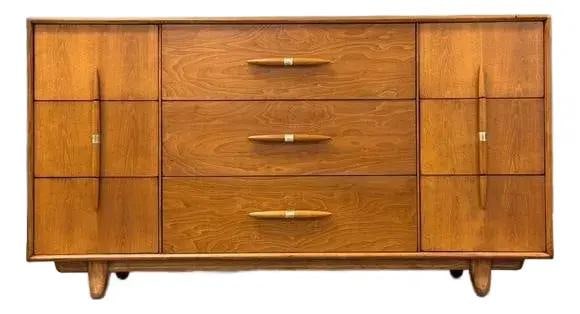 1960s Mid Century Modern Light Walnut Dresser by Red Lion: 1960s Mid Century Modern Light Walnut Dresser by Red Lion This mid-century modern dresser is crafted from light walnut and features polished steel hardware, embodying a classic design from the 1960s. 