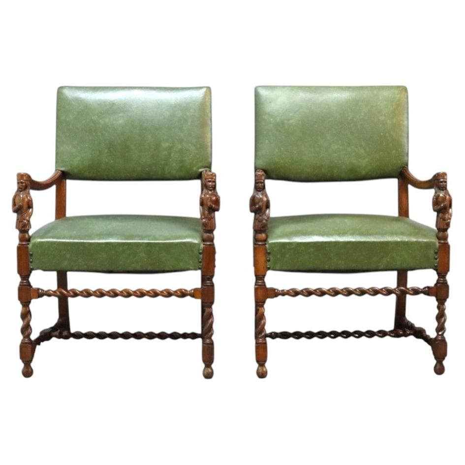 Set of 2 English Edwardian Walnut Figural Armchairs c1910: Set of 2 English Edwardian Walnut Figural Armchairs c1910 A distinguished set of two antique English Edwardian armchairs, crafted in walnut and dated to around 1910. The chairs feature figural carved 