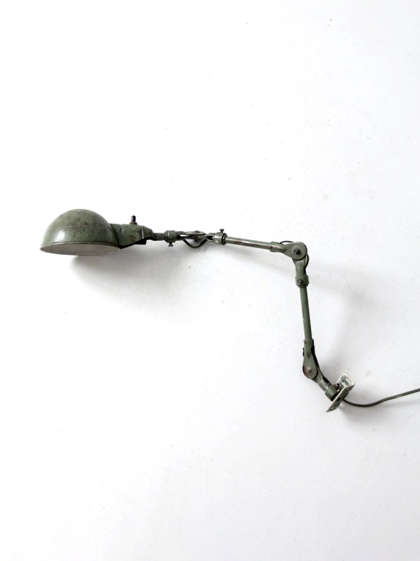 1940s Vintage American Industrial Task Lamp Green Articulating Arm: 1940s Vintage American Industrial Task Lamp Green Articulating Arm Introducing a Vintage American Industrial Task Lamp from the 1940s, featuring its original green paint that adds character to any spa