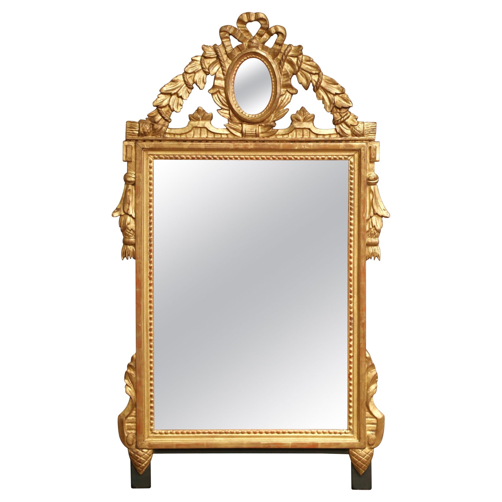 19th Century Louis XVI Giltwood Mirror with Oval Insert and Sculptural Crest: 19th Century Louis XVI Giltwood Mirror with Oval Insert and Sculptural Crest Elevate your space with this exquisite 19th-century French Louis XVI giltwood mirror, crafted circa 1870. This stunning pie