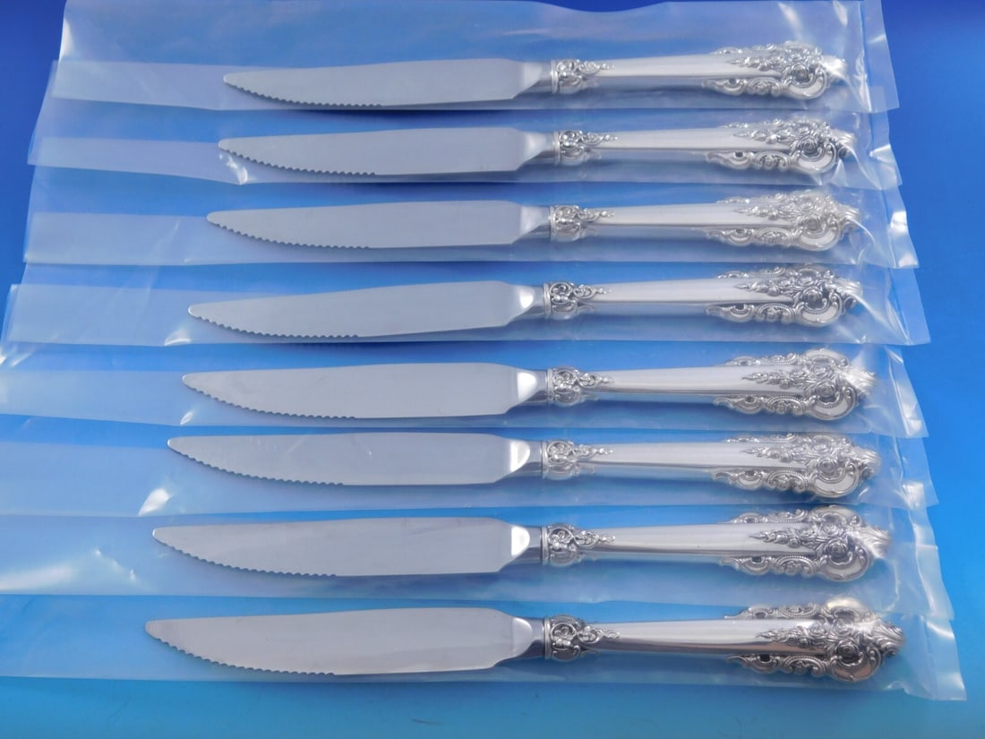 Wallace Grande Baroque Sterling Silver Steak Knife Set of 8 9 1/4": Wallace Grande Baroque Sterling Silver Steak Knife Set of 8 9 1/4" This exquisite set of 8 steak knives features the elegant Grande Baroque pattern by Wallace, crafted from high-quality sterling silve