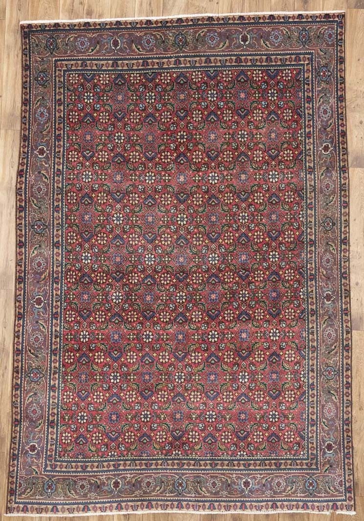 Hand Knotted Wool Tribal Allover Vintage Area Rug 6x9 Ft: Hand Knotted Wool Tribal Allover Vintage Area Rug 6x9 Ft This vintage hand-knotted wool rug features an allover tribal pattern in muted tones of red, purple, khaki, cream, blue, brown, and green. Orig