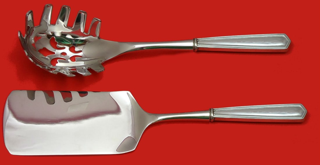 Brandon International Sterling Silver 2pc Pasta Server Set: Brandon International Sterling Silver 2pc Pasta Server Set Enhance your dining experience with the Brandon by International Sterling Silver Italian Pasta Server Set. This exquisite 2-piece hostess set