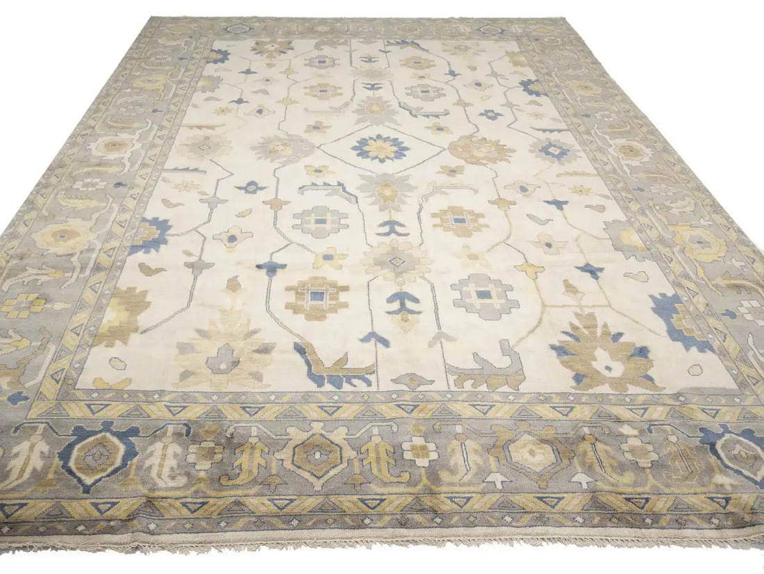 Large Hand-Knotted Wool Area Rug Floral Oushak Design 14x20 Feet: Large Hand-Knotted Wool Area Rug Floral Oushak Design 14x20 Feet This is a 14x20 foot hand-knotted Oushak oriental area rug featuring a floral pattern in muted tones of ivory, light gray, slate blue, 