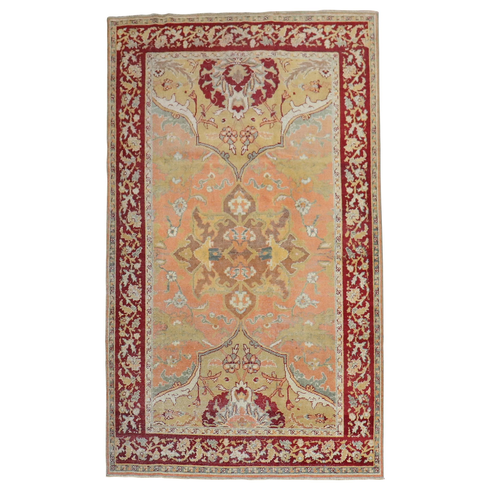 Antique Agra Hand-Knotted Wool Rug 4'9 x 7'10 India: Antique Agra Hand-Knotted Wool Rug 4'9 x 7'10 India This exquisite early 20th century antique Agra rug showcases a stunning canteloupe color field beautifully framed by a deep red border. Adorned with