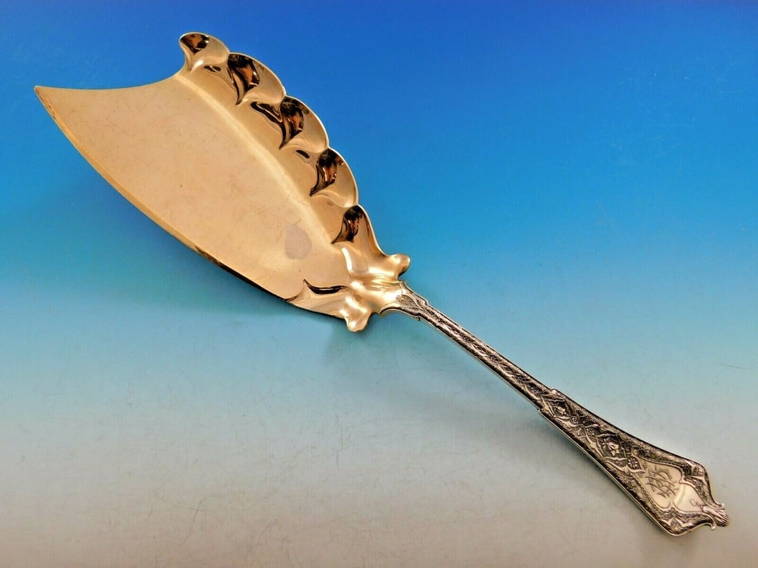 Tiffany & Co Persian Sterling Silver Ice Cream Server Rose Gold 11 5/8": Tiffany & Co Persian Sterling Silver Ice Cream Server Rose Gold 11 5/8" Experience the elegance of the Persian ice cream server by Tiffany & Co., a stunning piece crafted from sterling silver. This ex
