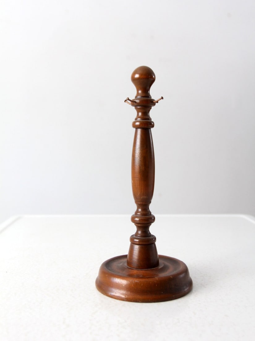 Antique Wooden Display Stand with Metal Hooks 11.5 Inch: Antique Wooden Display Stand with Metal Hooks 11.5 Inch Showcase your treasures with this elegant antique display stand, featuring a beautifully turned wood countertop. Designed with three small metal