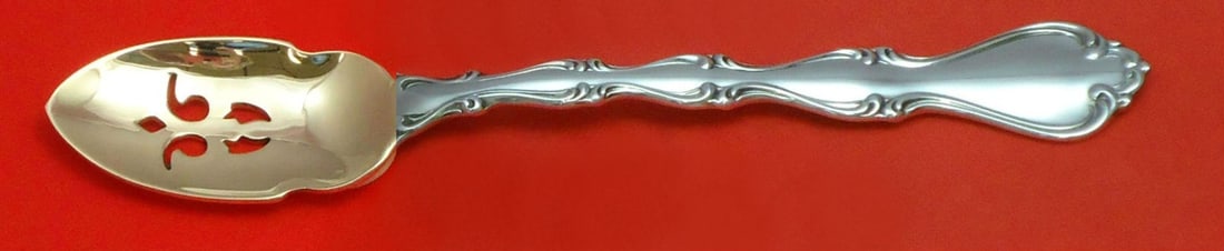Towle Country Manor Sterling Silver Pierced Olive Spoon 6 1/8": Towle Country Manor Sterling Silver Pierced Olive Spoon 6 1/8" This elegant olive spoon is custom made in the classic Country Manor pattern by Towle. Crafted from high-quality sterling silver, this pi