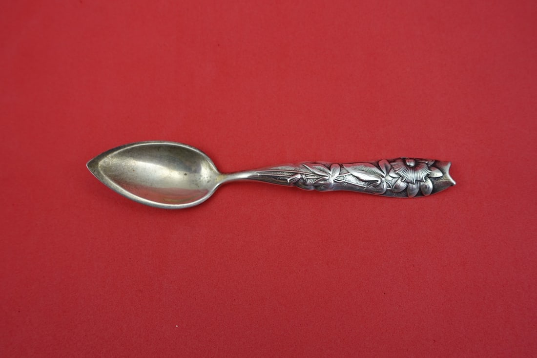 Sterling Silver Grapefruit Spoon Flora Pattern by Shiebler 5 3/4 Inch: Sterling Silver Grapefruit Spoon Flora Pattern by Shiebler 5 3/4 Inch This is a Shiebler sterling silver grapefruit spoon in the Flora pattern, featuring a passion flower motif. The spoon measures 5 3