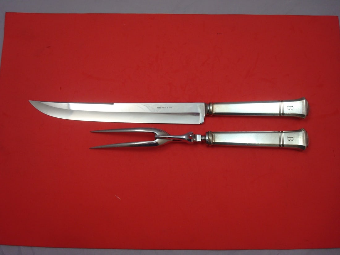Tiffany & Co. Windham Sterling Silver Roast Carving Set 2pc: Tiffany & Co. Windham Sterling Silver Roast Carving Set 2pc This exquisite two-piece roast carving set is crafted in sterling silver and features the elegant Windham pattern by Tiffany & Co. Each piec