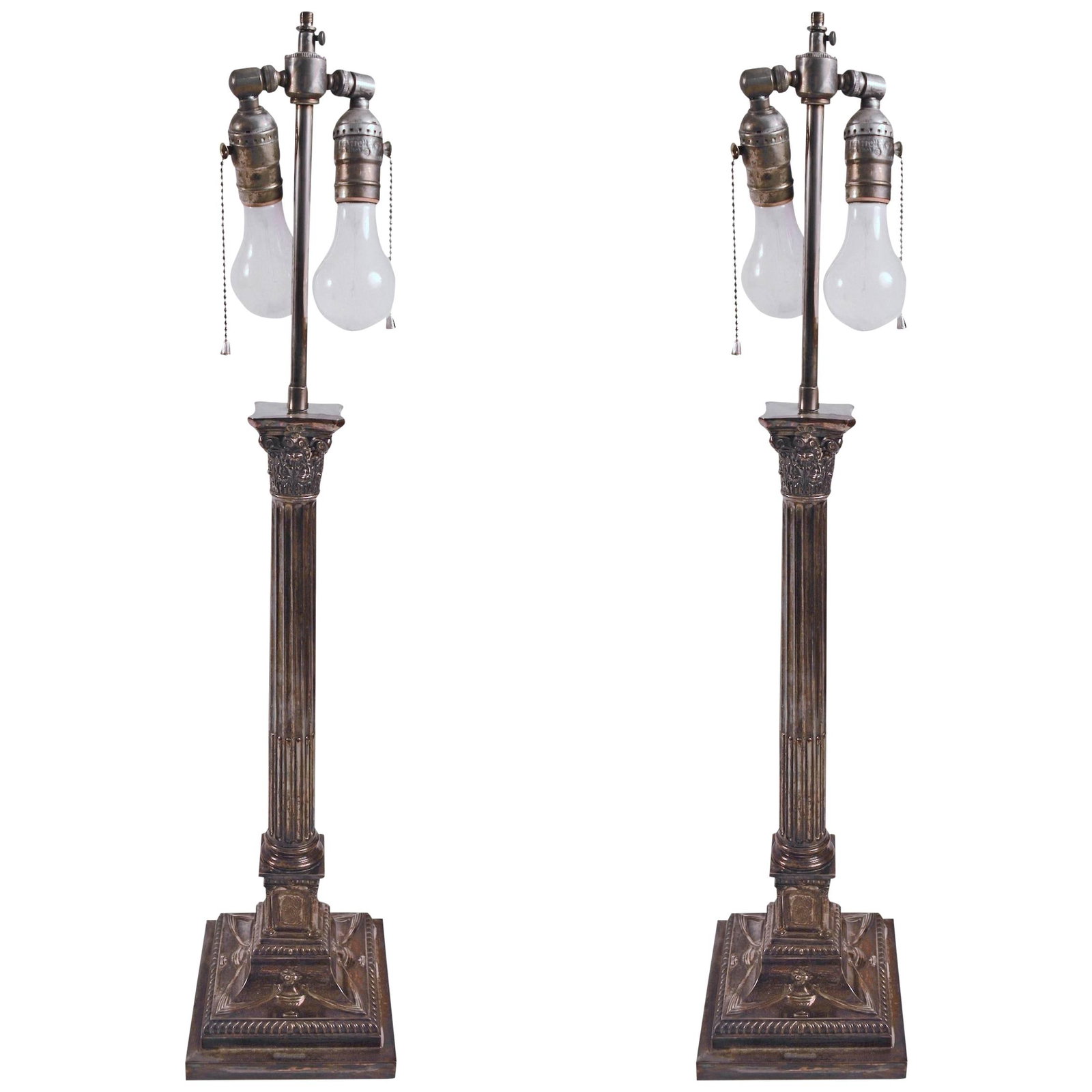 Elegant Pair of Classical Silver Plate Column Lamps: Elegant Pair of Classical Silver Plate Column Lamps This elegant pair of classical silver plate column lamps features intricate urn and swag decorations on the base, adding a touch of sophistication t