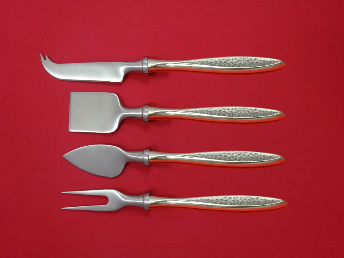 International Sterling Silver Snowflake 4pc Cheese Serving Set: International Sterling Silver Snowflake 4pc Cheese Serving Set Discover the elegant Snowflake by International Sterling Silver Cheese Serving Set, a 4-piece hostess set that combines exquisite design 